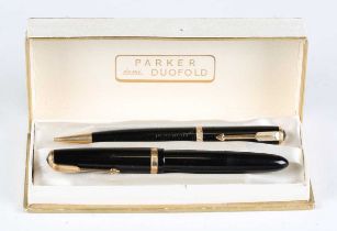 A Parker Duofold fountain pen and matching propelling pencil, the case detailed 'Parker demi