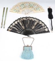 A 19th century ebony and piqué inlaid folding fan, length 23cm, a 19th century bone and silk folding