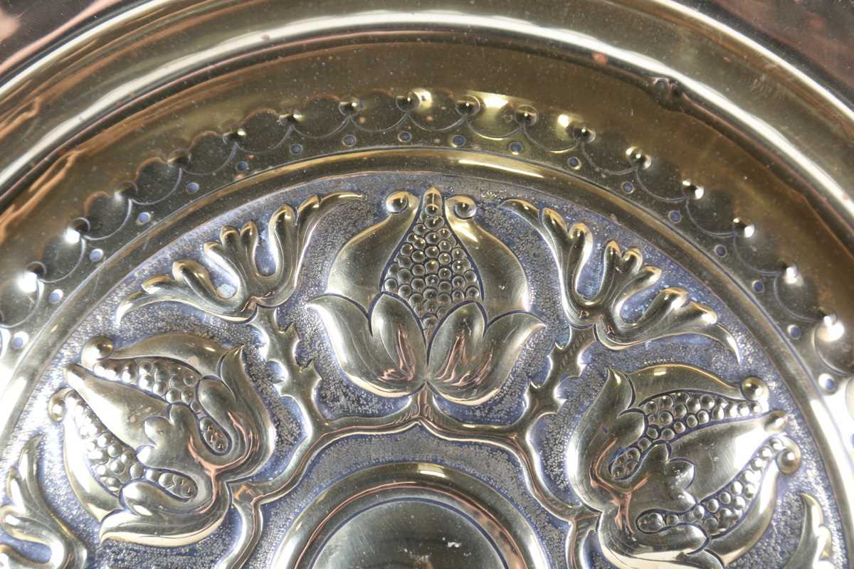 An early 20th century Arts and Crafts brass charger, the centre finely worked with a band of - Image 3 of 17
