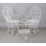 A pair of early 20th century wirework garden chairs, height 97cm, width 54cm, and a matching