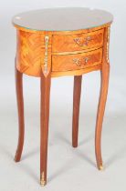 A late 20th century French kingwood and gilt metal mounted oval bedside table, height 65cm, width