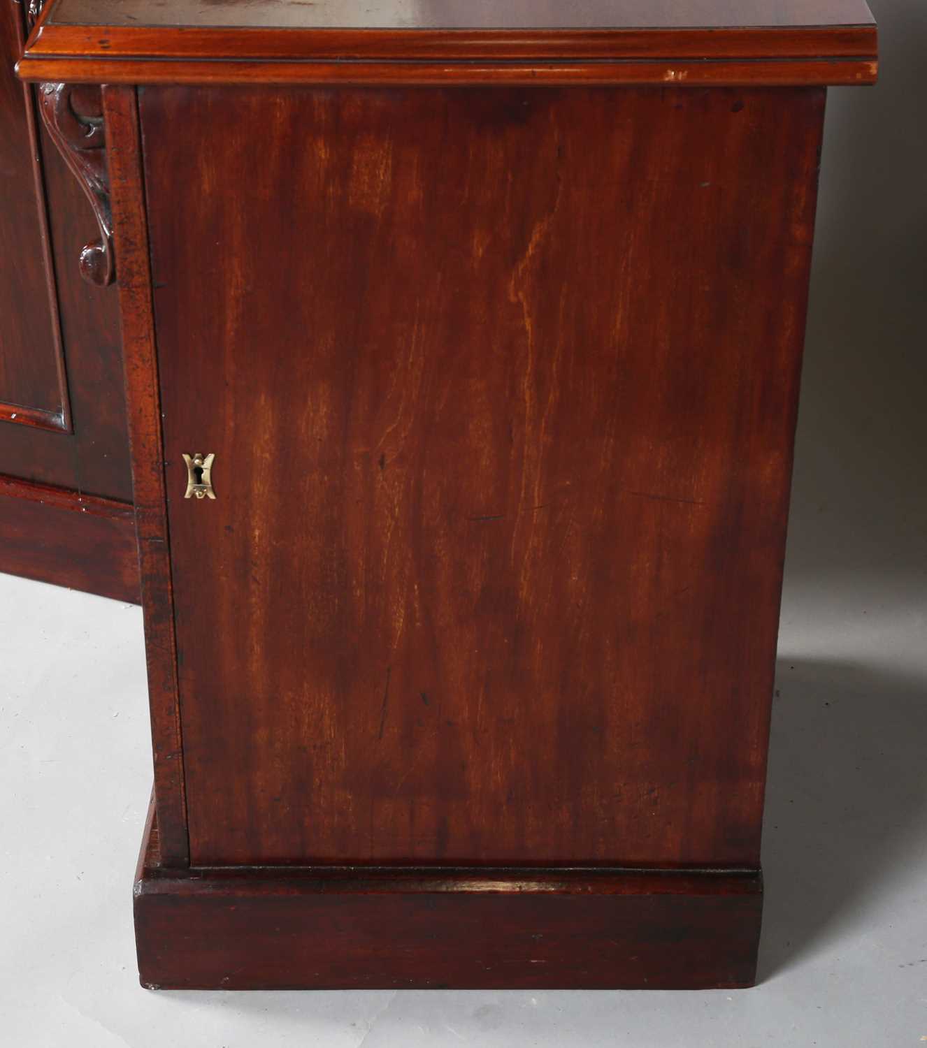 A pair of Victorian and later mahogany pedestal cabinets, each fitted with an arched panel door, - Image 8 of 10