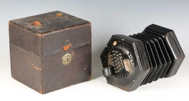 An early 20th century forty-eight button concertina by Lachenal & Co, London, the ebonized ends with