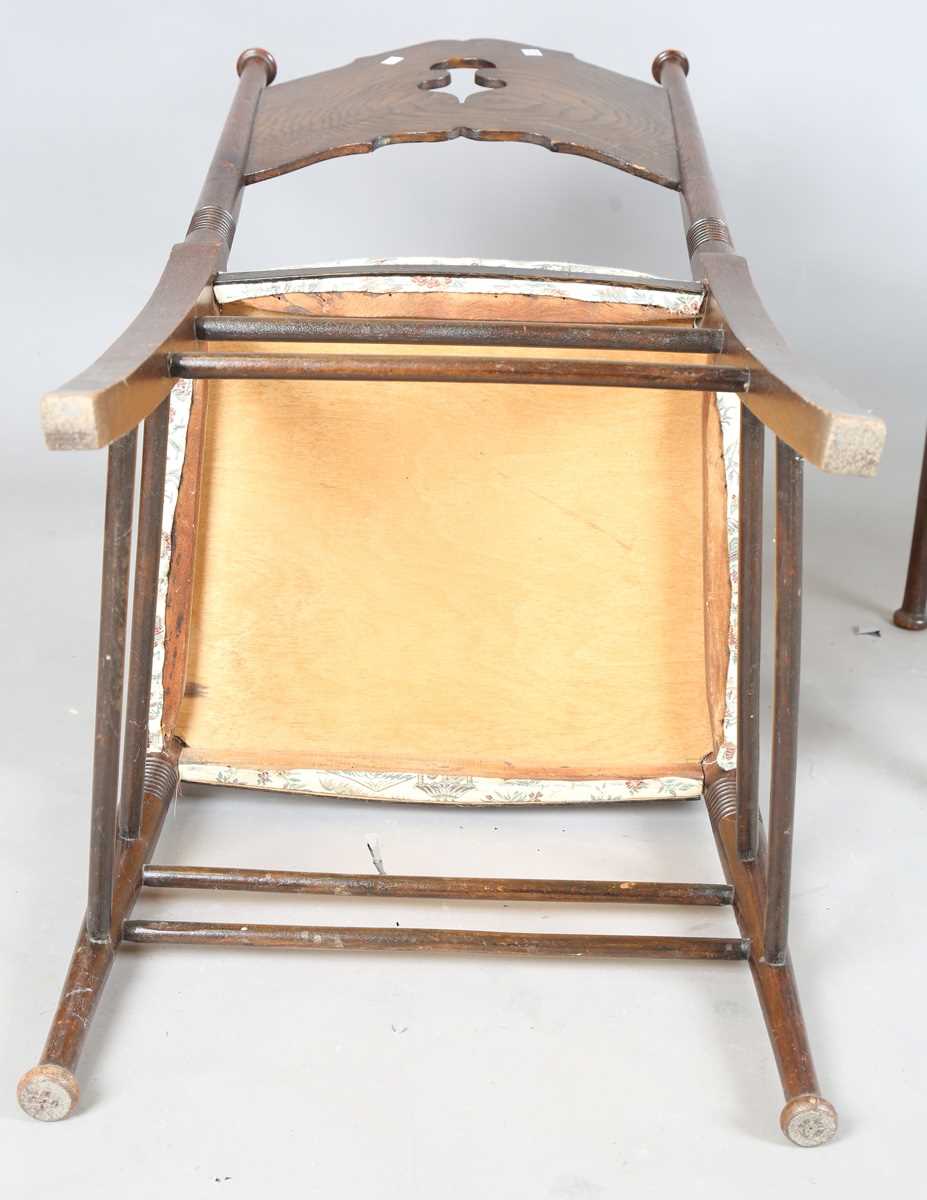 A pair of early 20th century Arts and Crafts oak and ash framed elbow chairs, in the manner of - Image 12 of 12