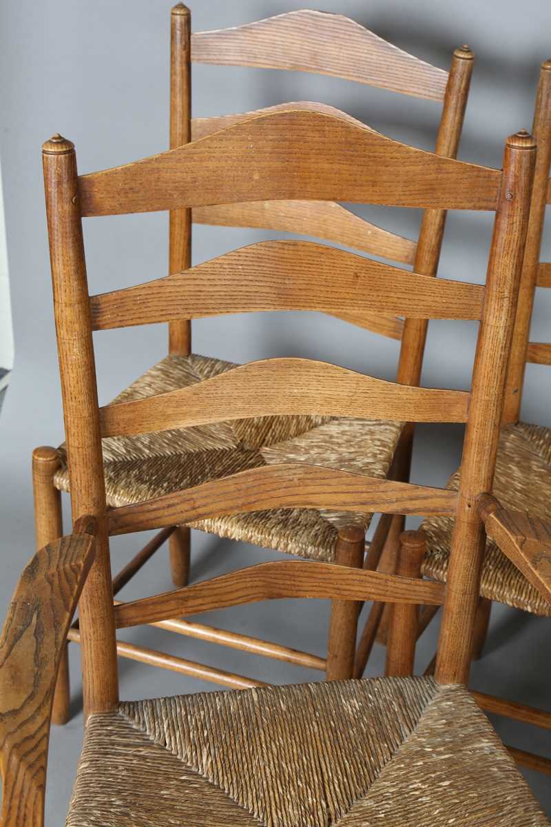 A set of six early 20th century Arts and Crafts ash framed ladder back chairs, in the manner of - Image 2 of 15