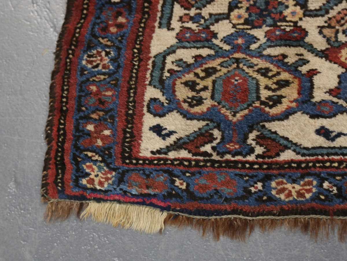 A Sparta rug, West Anatolia, early 20th century, the pink field with a column of medallions, - Image 7 of 8