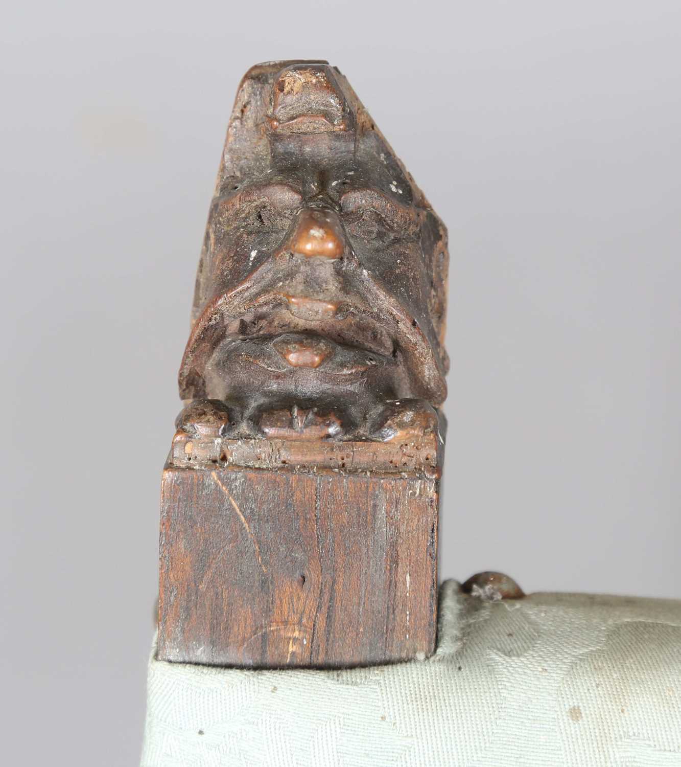 A late 17th century Continental walnut armchair, the finials carved with masks, the two front legs - Image 2 of 15