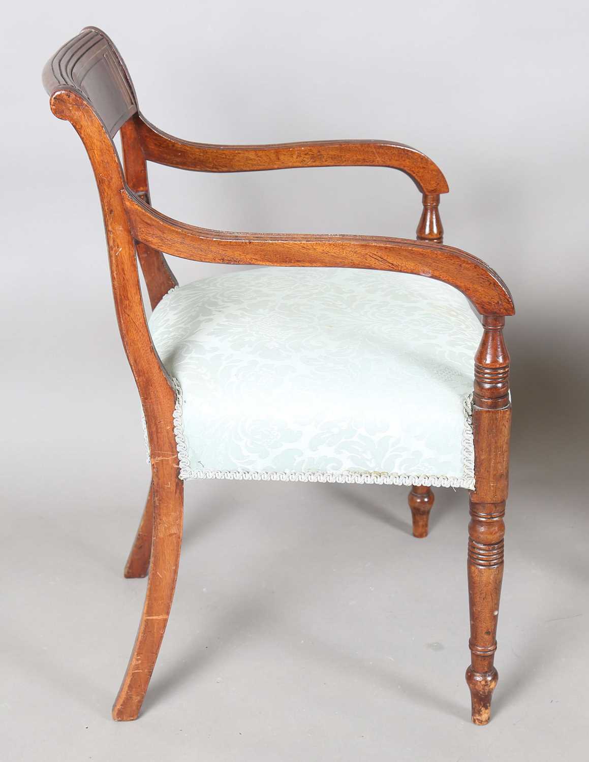 A set of eight Regency mahogany and brass inlaid bar back dining chairs, comprising two carvers, - Image 9 of 17