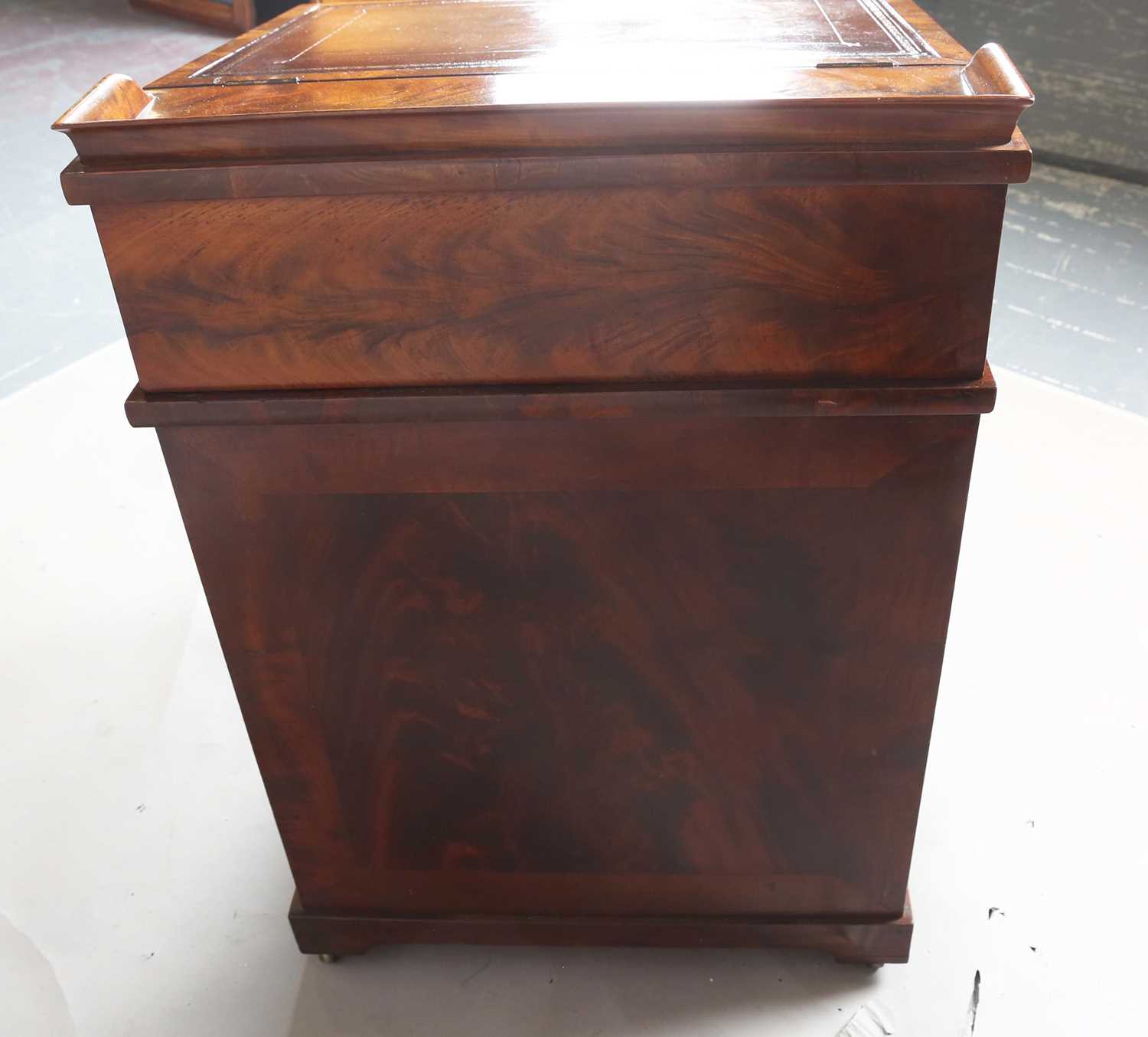 A good early Victorian flame mahogany Davenport, the hinged writing slope inset with tooled - Image 12 of 12