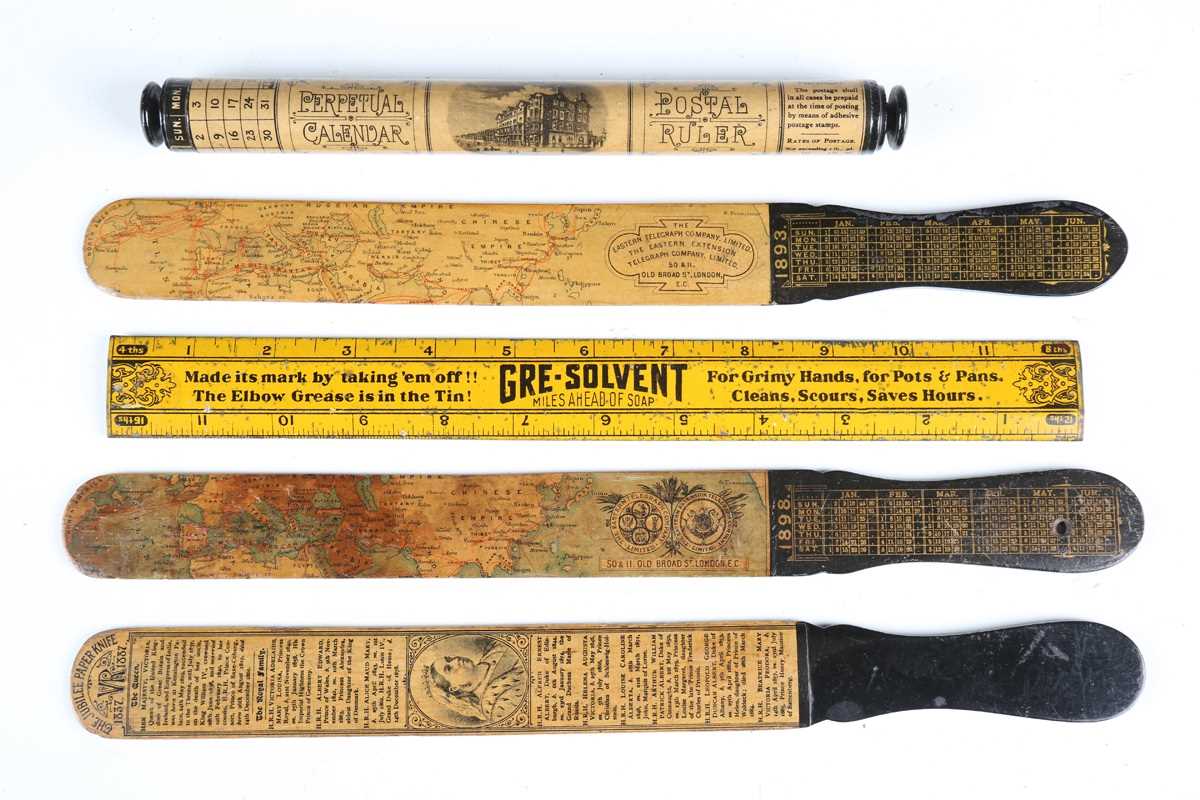 A group of three late Victorian transfer printed paper knives, two made for 'The Eastern Telegraph