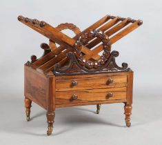 A Regency rosewood three-division Canterbury with bellflower wreath mounts above two drawers