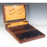 A 19th century mahogany writing box, the lid with engraved brass recessed handle, the hinged writing