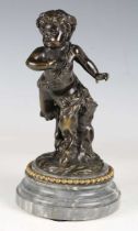 A 19th century French dark green/brown patinated cast bronze figure of young Bacchanalian fawn, in