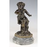 A 19th century French dark green/brown patinated cast bronze figure of young Bacchanalian fawn, in