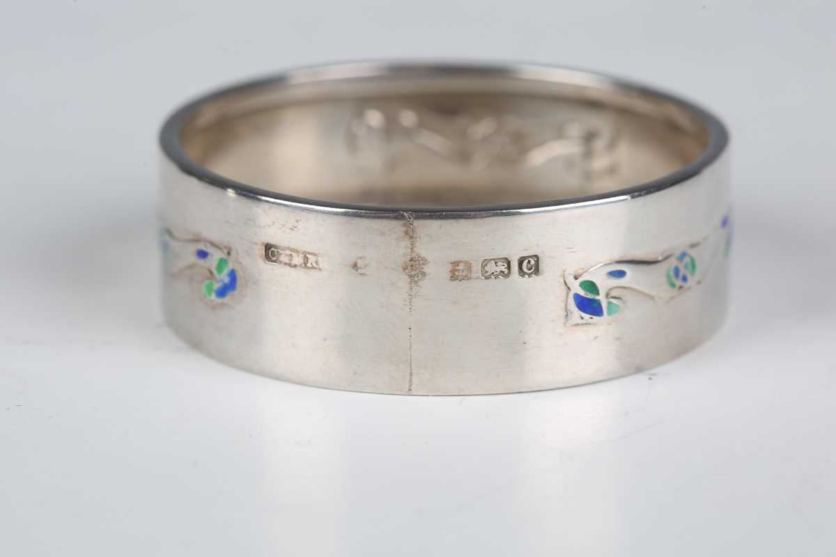 A pair of Liberty & Co 'Cymric' silver and enamelled napkin rings, Birmingham 1902, diameter 4. - Image 9 of 18