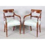A set of eight Regency mahogany and brass inlaid bar back dining chairs, comprising two carvers,