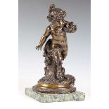 A mid-19th century French patinated cast bronze figure of a Bacchanalian fawn, in the manner of