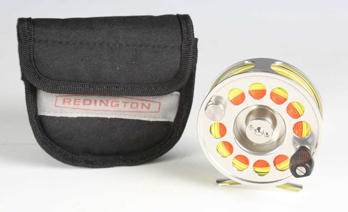 A group of five modern fly fishing reels, including a Hardy 'Uniqua' 5/6, diameter 9cm, boxed, an - Image 9 of 10