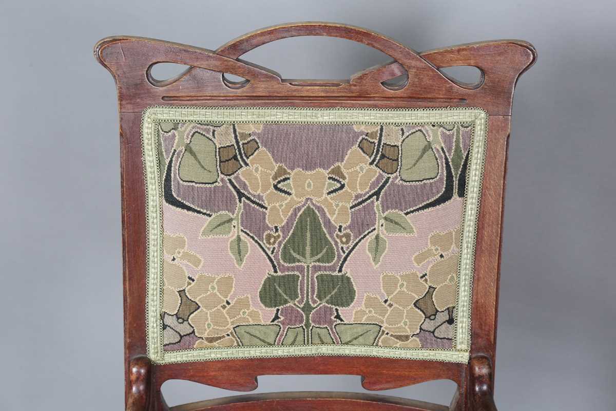 An Art Nouveau stained beech three-piece salon suite with pierced showframe and contemporary fabric, - Image 18 of 27