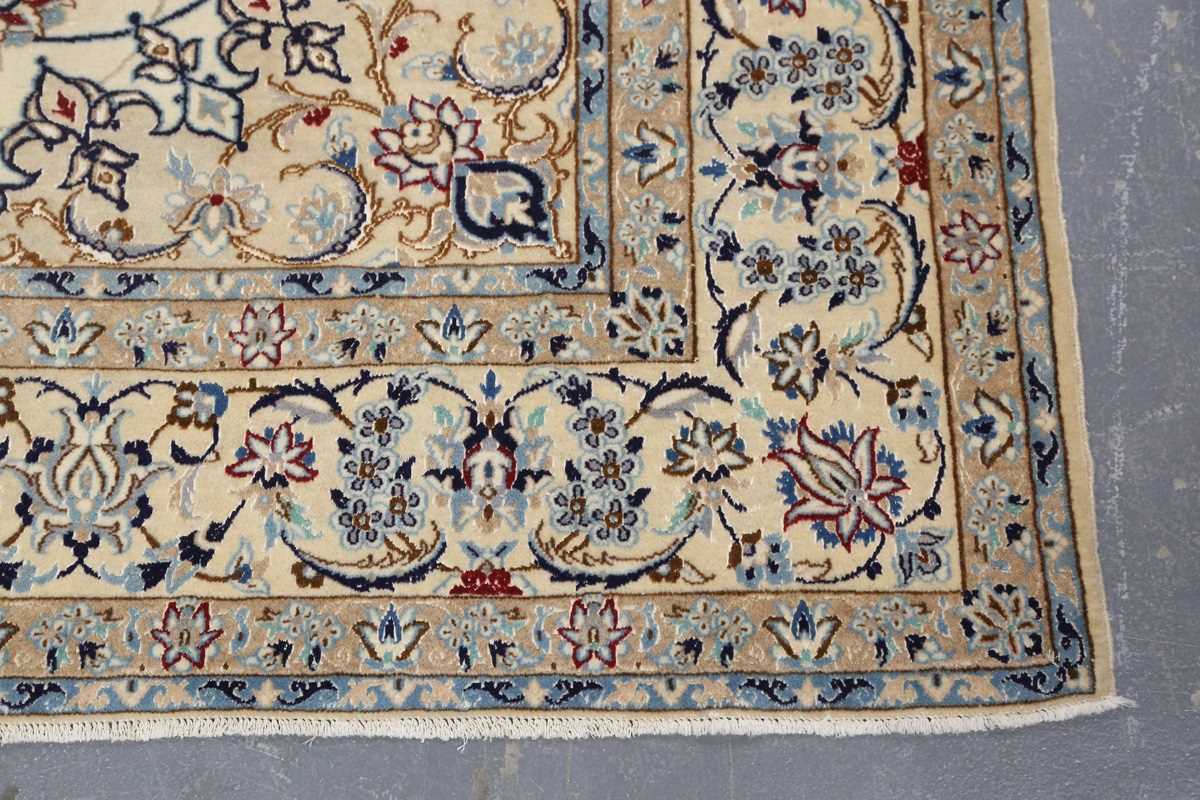 A Nain carpet, Central Persia, late 20th century, the cream field with a flowerhead medallion and - Image 5 of 8