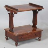 A Regency rosewood two-tier étagère, fitted with a single drawer, on turned legs, height 60cm, width