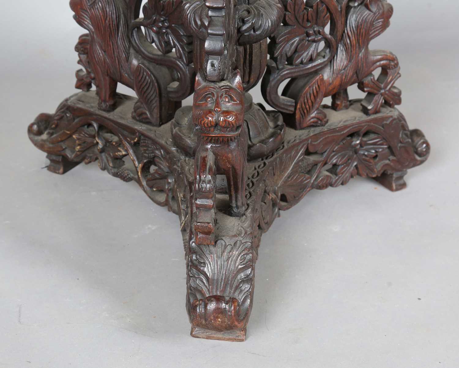 A 19th century Burmese hardwood centre table, the shaped circular top above a tripod support of - Image 6 of 13