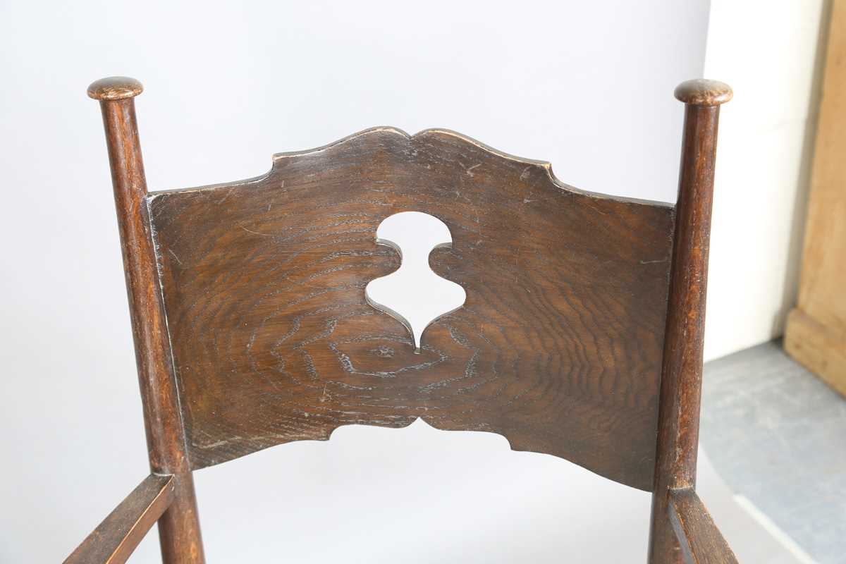 A pair of early 20th century Arts and Crafts oak and ash framed elbow chairs, in the manner of - Image 6 of 12