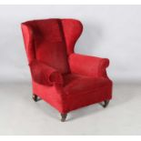 A late Victorian wing back armchair, upholstered in claret velour, height 95cm, width 84cm, depth