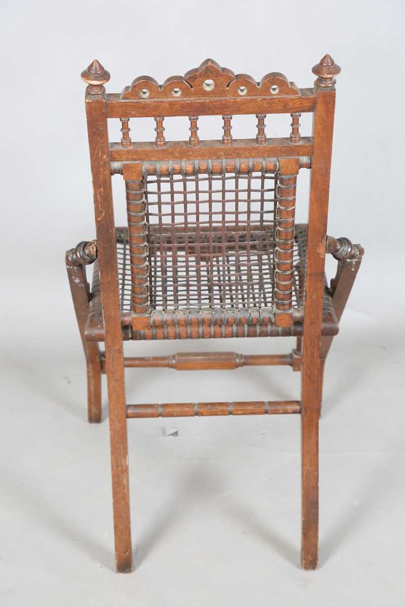 A late 19th century American Arts and Crafts walnut framed side chair by George Hunzinger, the - Image 9 of 12