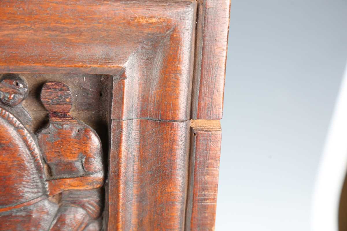 A 19th century Continental walnut wall plaque, carved in relief with the execution of a kneeling - Image 3 of 4