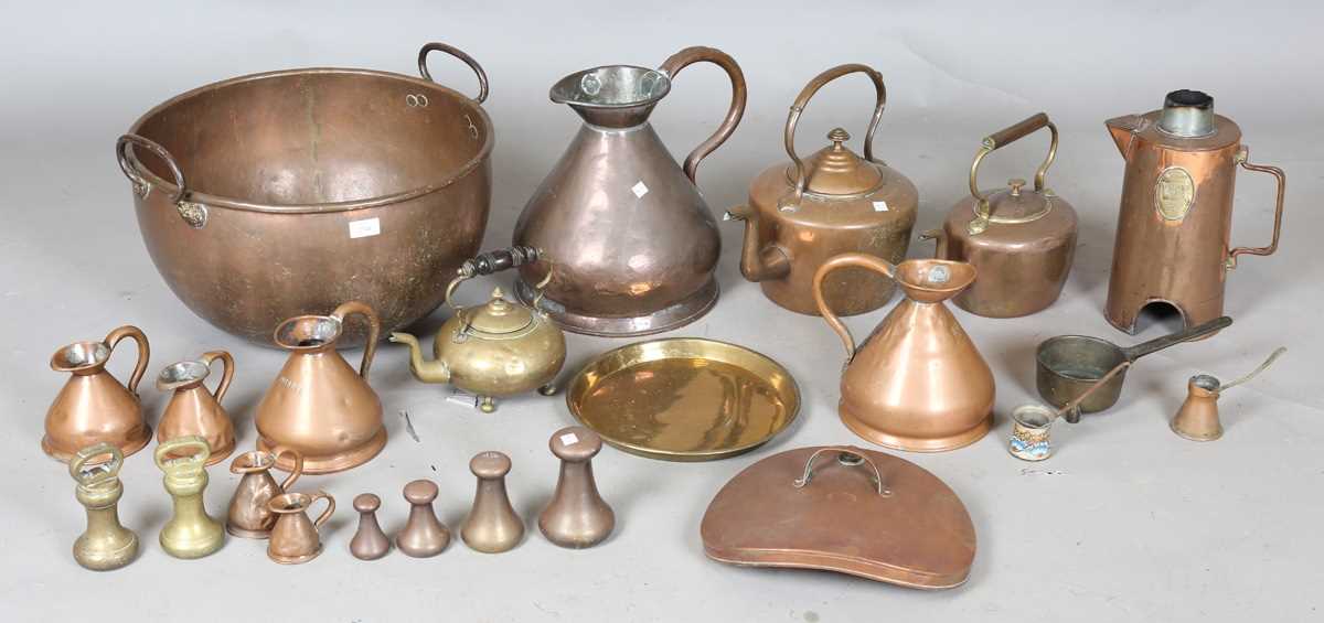 A collection of mainly 19th century copper wares, including a large twin-handled bowl, diameter