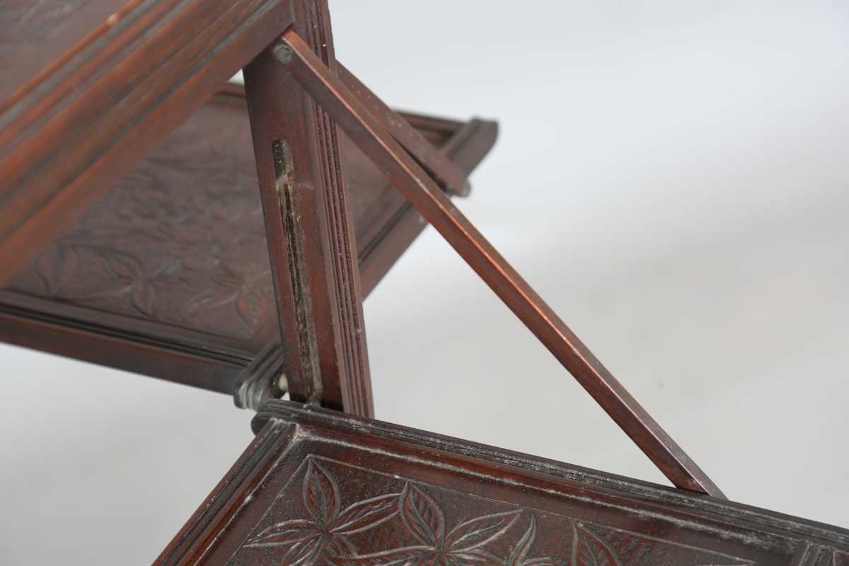 A late Victorian Aesthetic Movement mahogany tea table, fitted with a drop-leaf section to each - Image 5 of 9