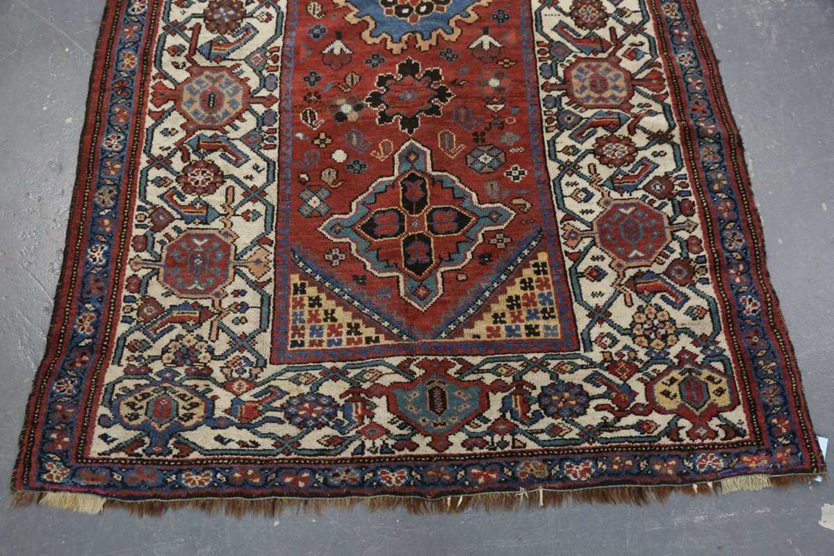 A Sparta rug, West Anatolia, early 20th century, the pink field with a column of medallions, - Image 6 of 8