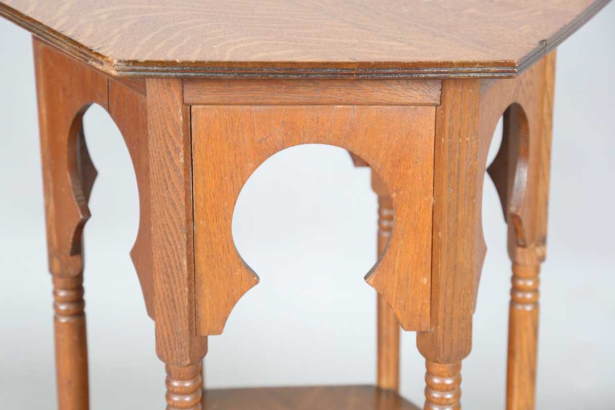 An Edwardian Arts and Crafts oak hexagonal occasional table, possibly by Liberty & Co, the Moorish - Image 3 of 8