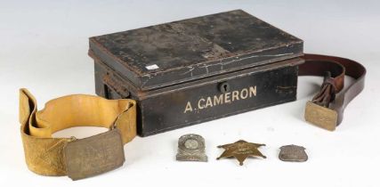 A group of American police badges, comprising a Pinkerton National Detective Agent badge, a Fox Lake