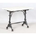 A late 19th century cast iron bistro table with a rectangular white marble top, height 76cm,