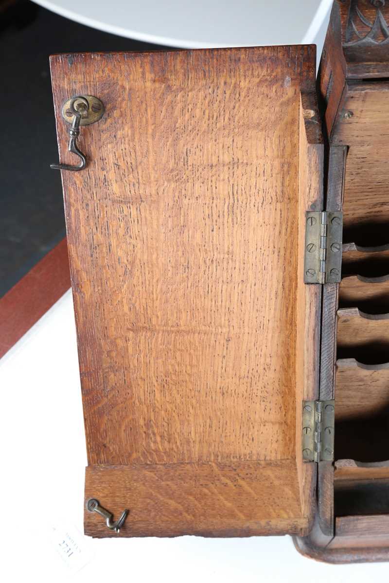 A late Victorian oak slope-front stationery box, carved with leaves and flowers, height 37cm, - Image 6 of 16