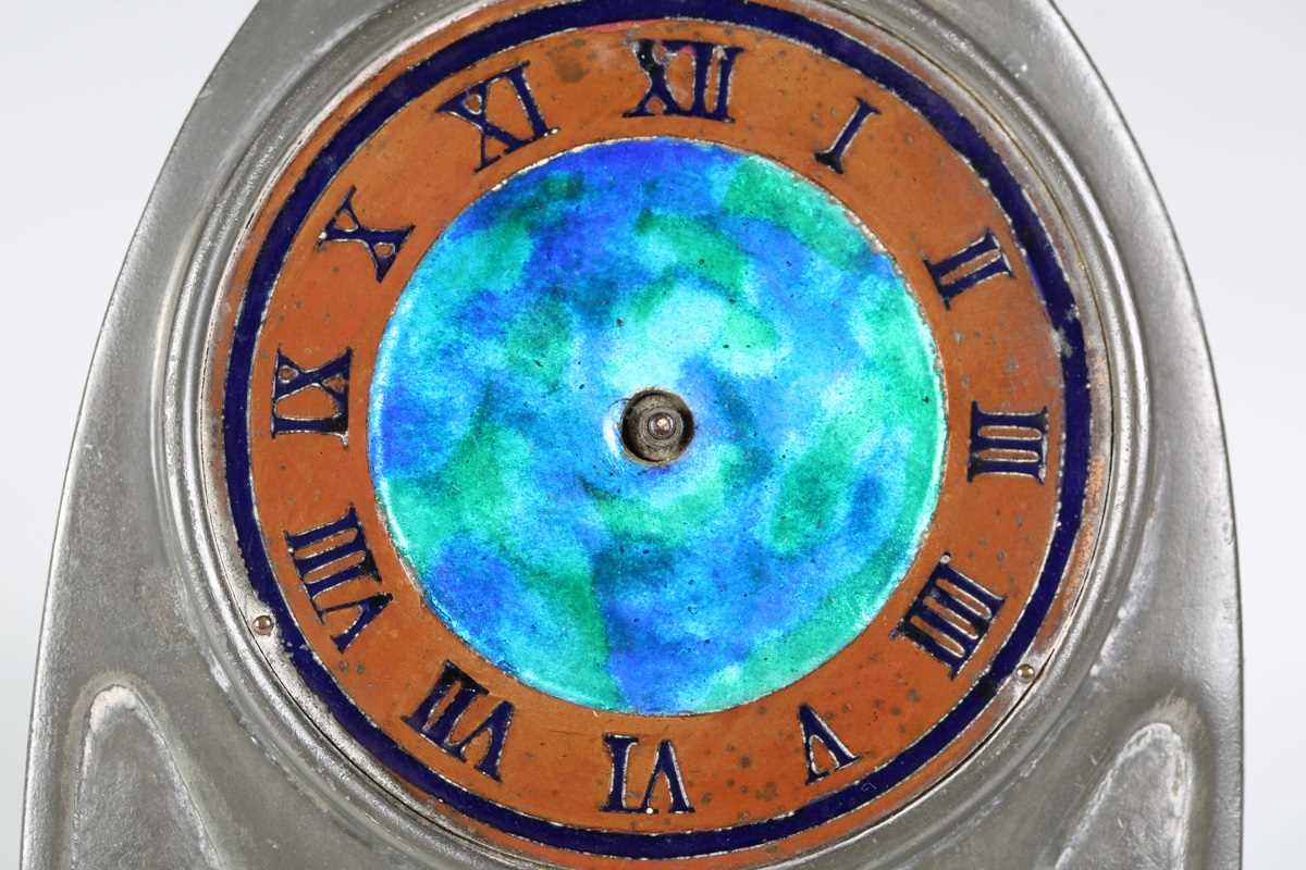 A Liberty & Co 'Tudric' pewter timepiece, model number '0975', the lancet arched front with a blue/ - Image 2 of 9