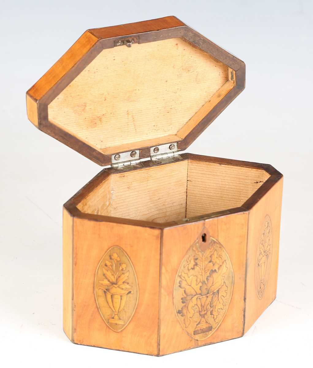 A George III satin birch canted hexagonal tea caddy, the hinged lid and front panels inlaid with - Image 6 of 10