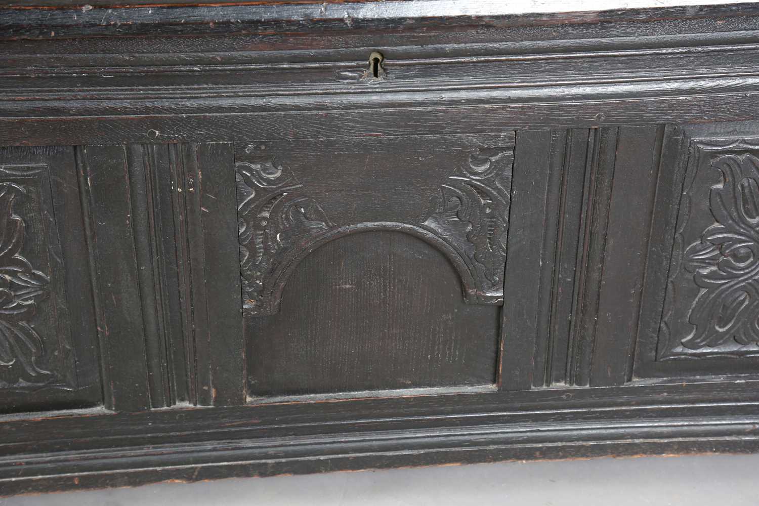 An 18th century panelled oak coffer with a domed lid and carved front, height 61cm, width 125cm, - Image 7 of 12