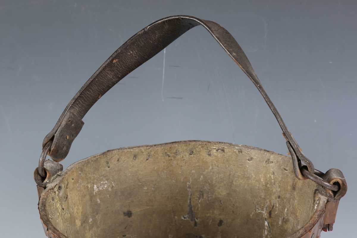 A late 18th/19th century painted leather fire bucket with strap handle and transfer printed royal - Image 3 of 8