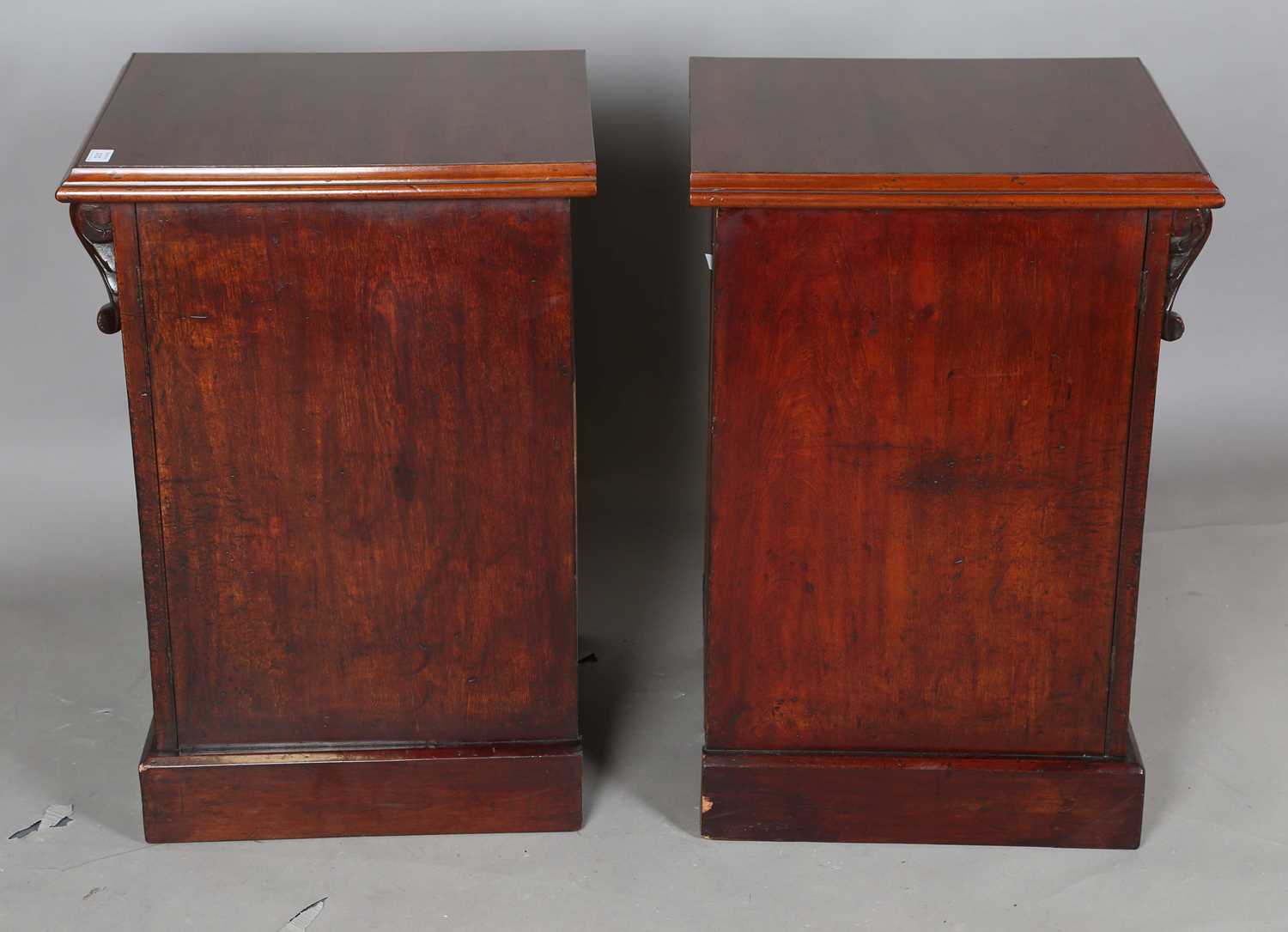 A pair of Victorian and later mahogany pedestal cabinets, each fitted with an arched panel door, - Image 9 of 10