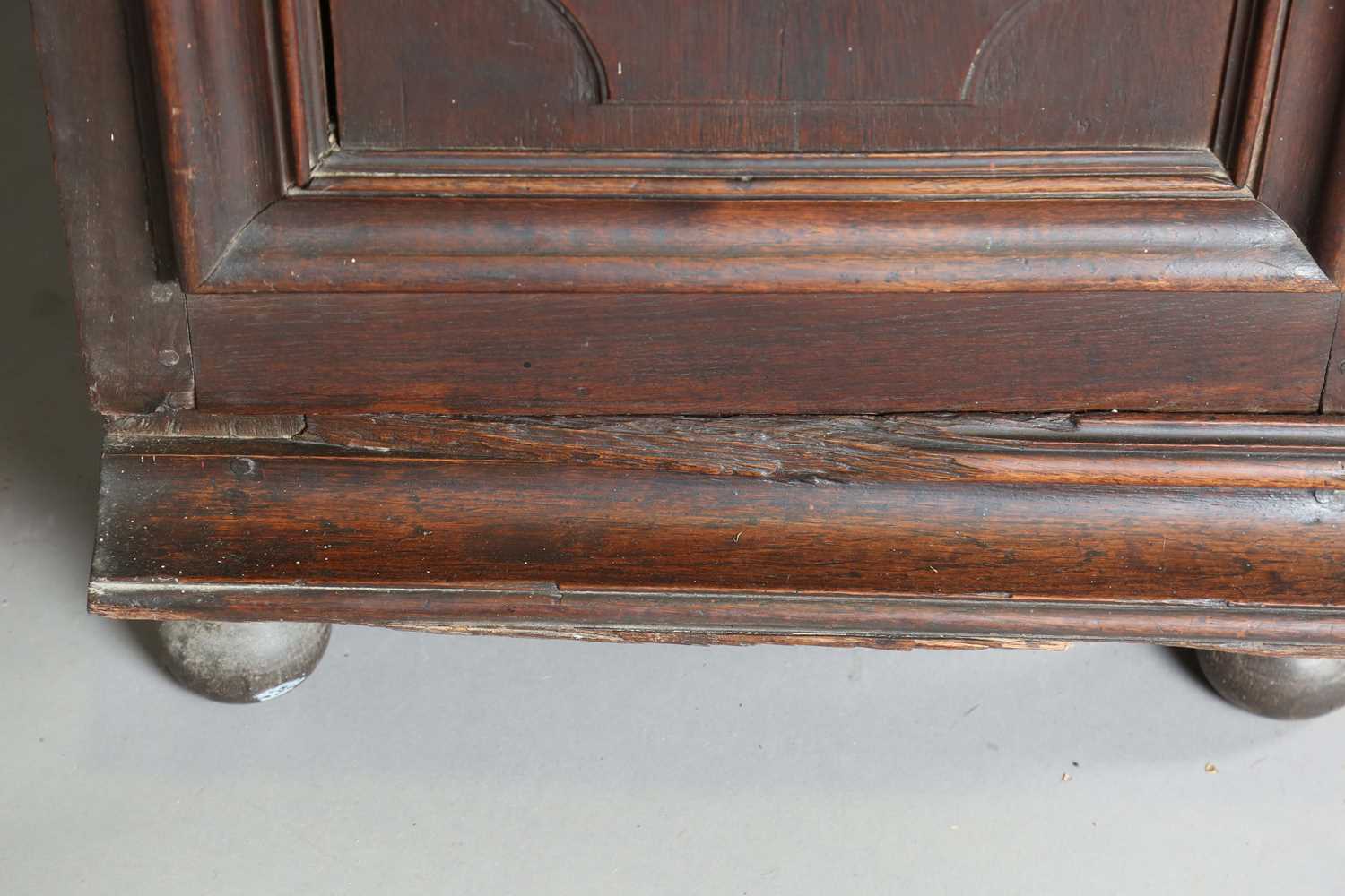 A large 18th century Continental oak cupboard, fitted with four panelled doors and two drawers, - Image 12 of 17
