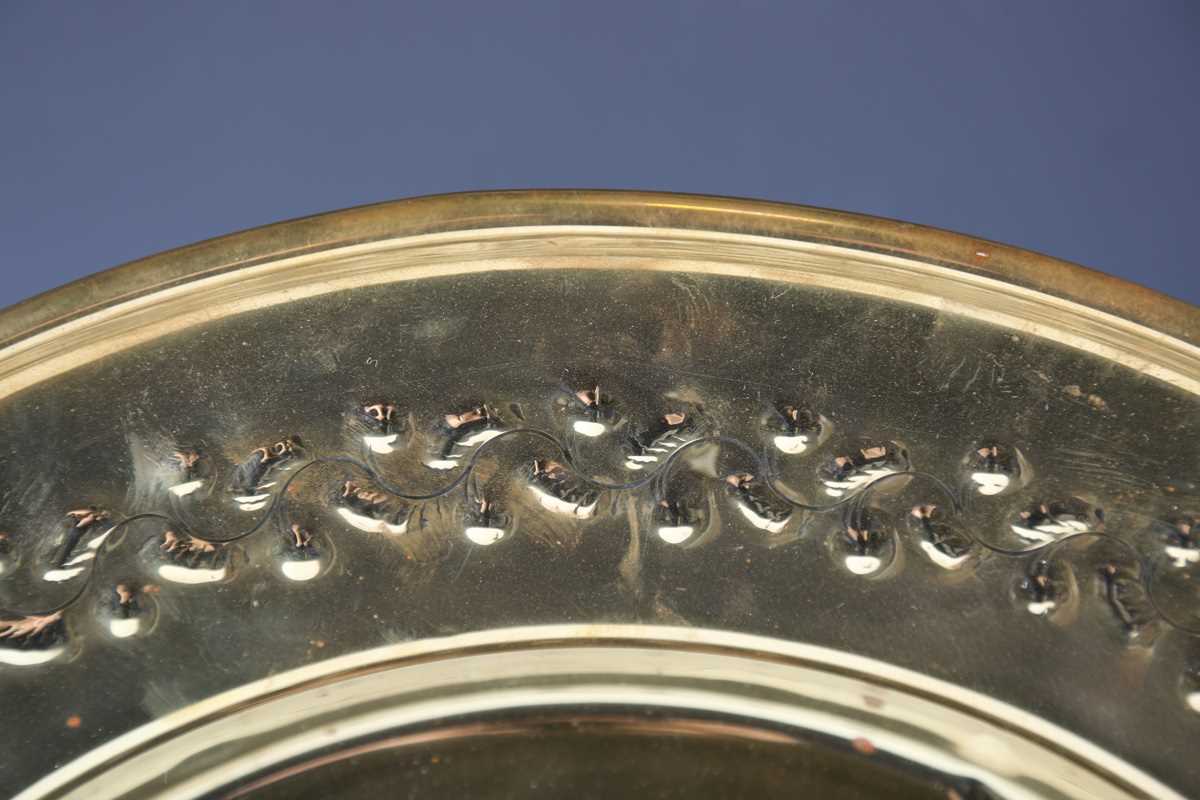 An early 20th century Arts and Crafts brass charger, the centre finely worked with a band of - Image 7 of 17