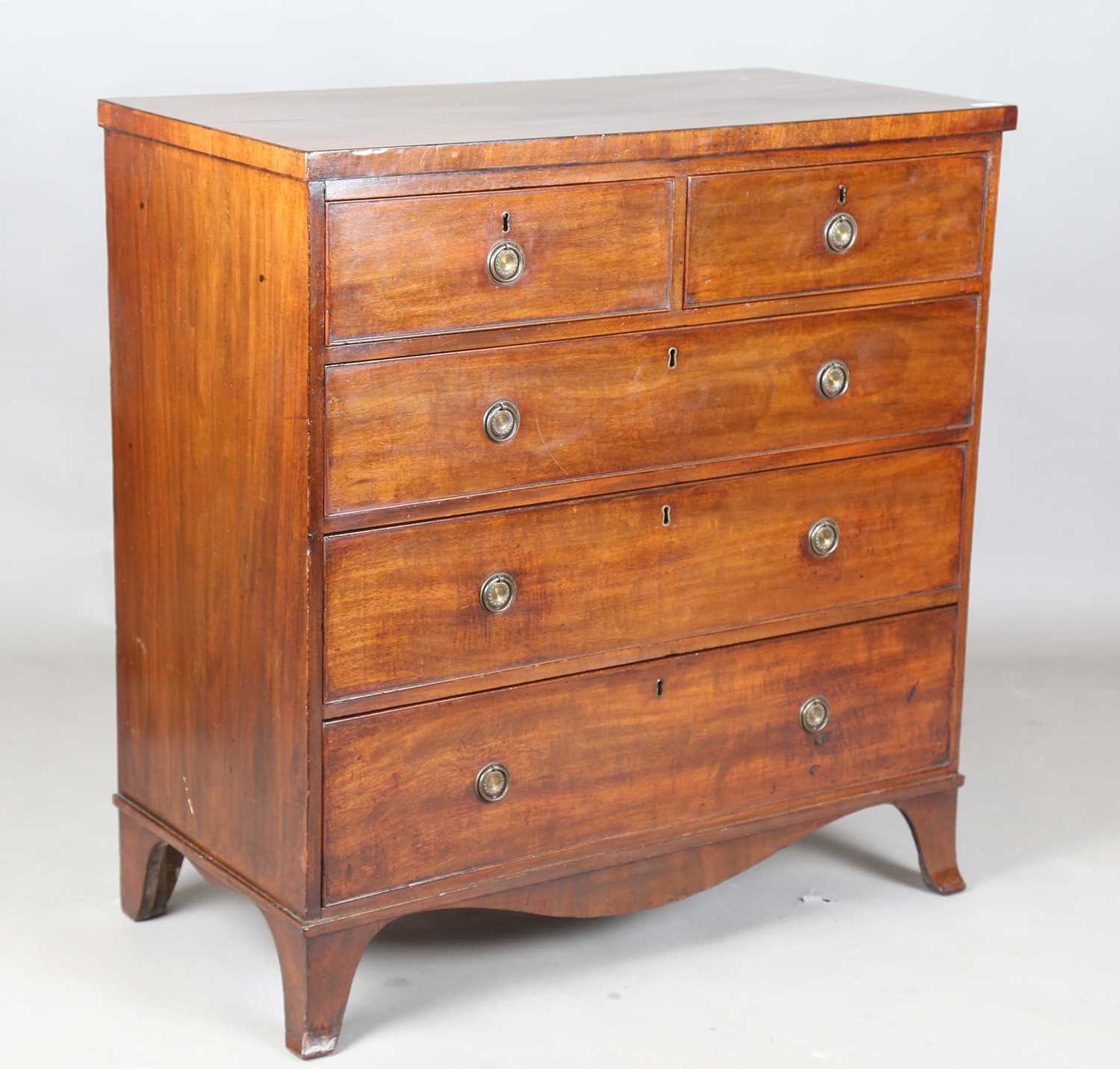 A George III mahogany chest of drawers, on splayed bracket feet, height 107cm, width 104cm, depth