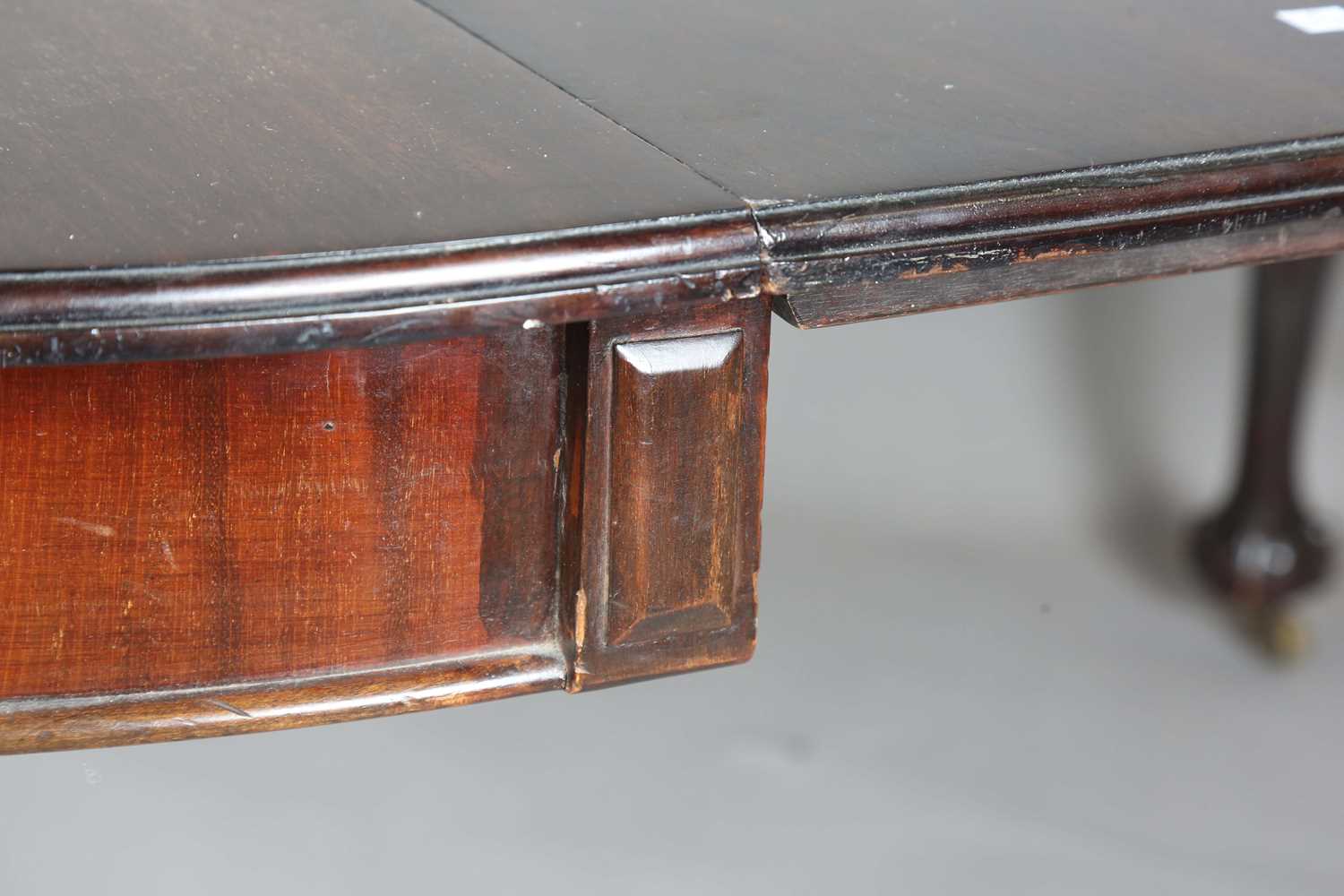 An early 20th century mahogany extending dining table, the circular top with single extra leaf, - Image 7 of 19