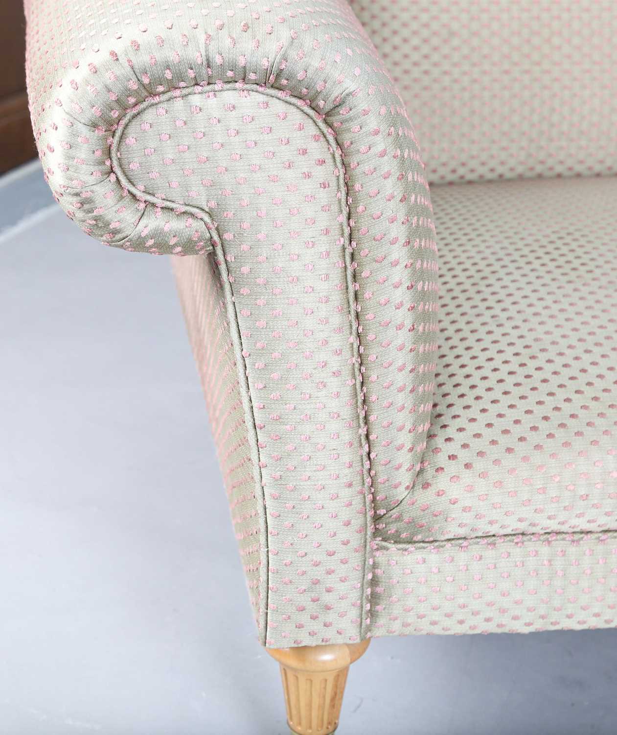 A David Linley scroll arm sofa, upholstered in pink dotted gilt damask, raised on fluted wooden legs - Image 9 of 17