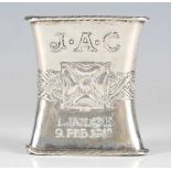 An early 20th century Arts and Crafts silver triangular shaped napkin ring by Ramsden & Carr, London