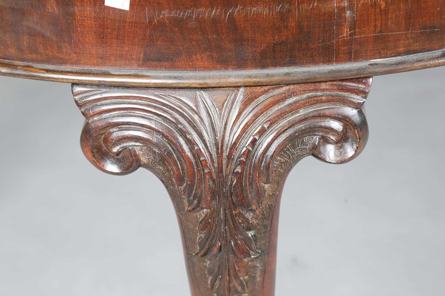 An early 20th century mahogany extending dining table, the circular top with single extra leaf, - Image 4 of 19