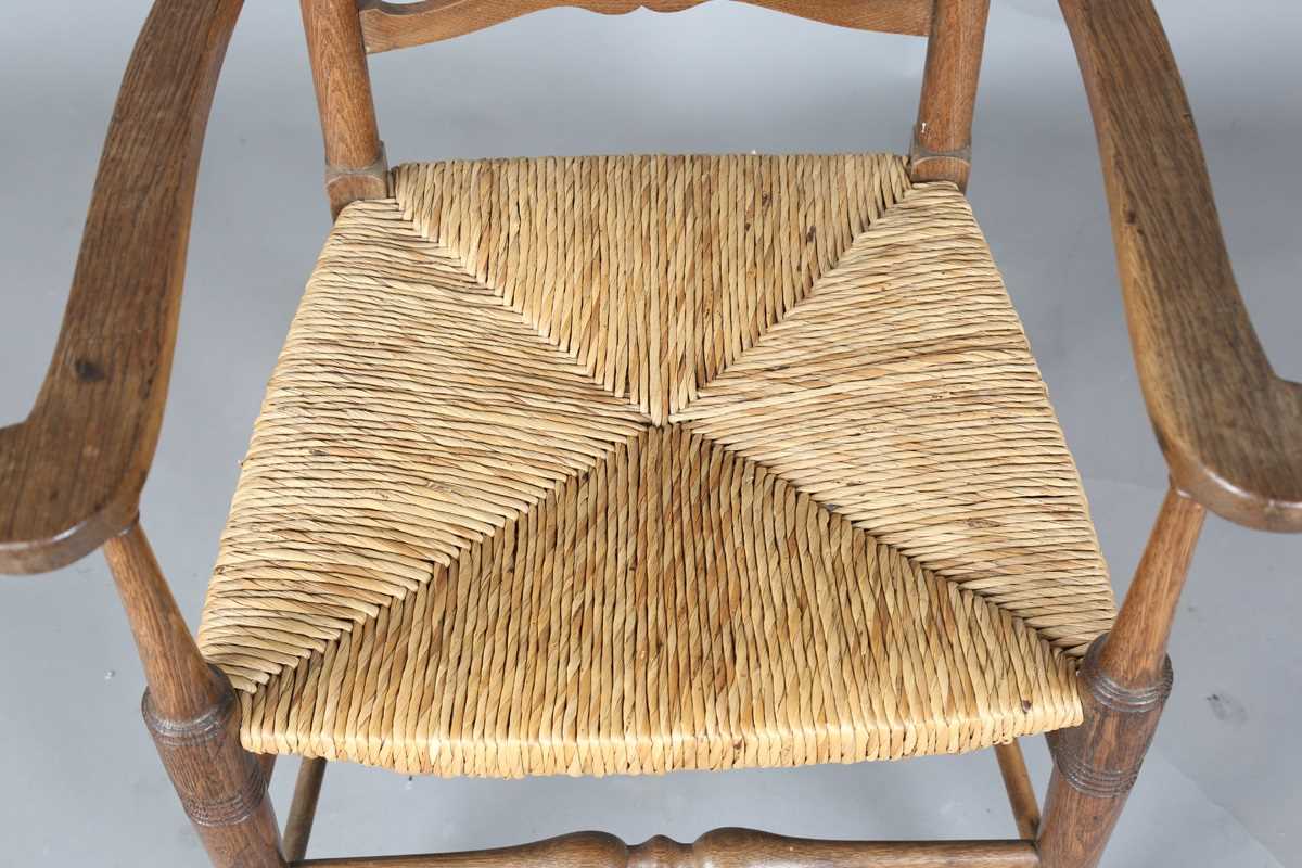 An Edwardian Arts and Crafts oak framed elbow chair, in the manner of William Birch, height 107cm, - Image 3 of 8